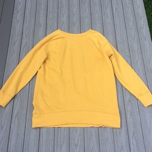 Oversized mustard yellow long sleeve shirt.